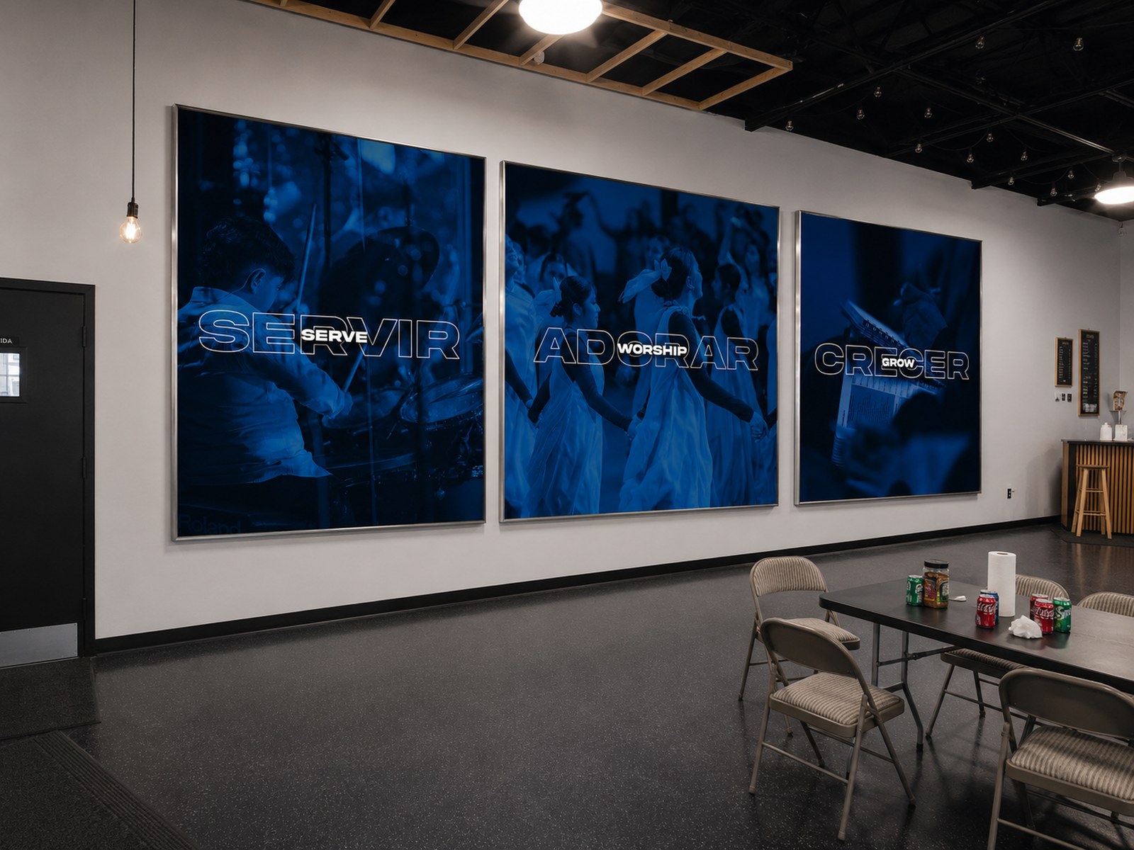 Servir, Adorar, Crecer wall prints installed in the Nuevo Amanecer cafeteria